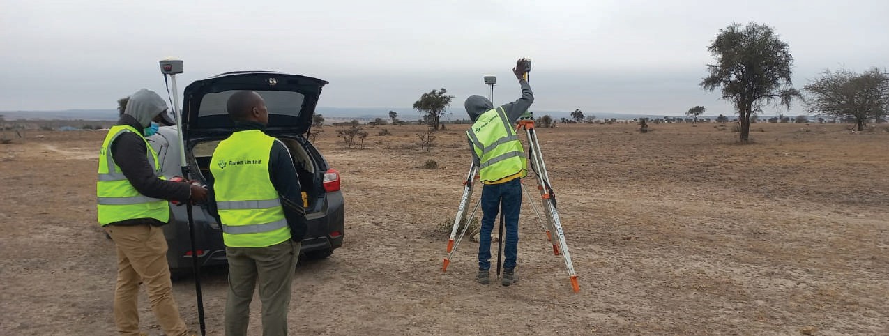 Engineering survey team working in the field